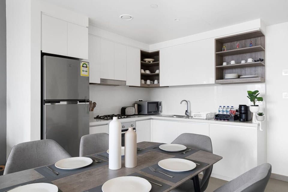 A bright and spacious kitchen showcasing modern appliances, perfect for whipping up meals and entertaining