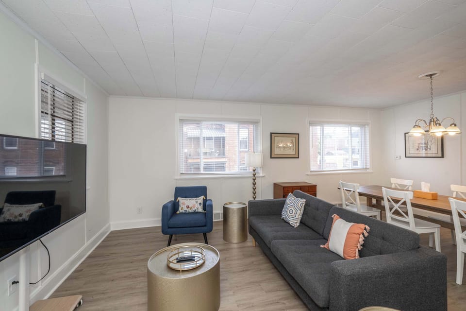 Curl up in the chic living room & stream your favorites on the smart TV