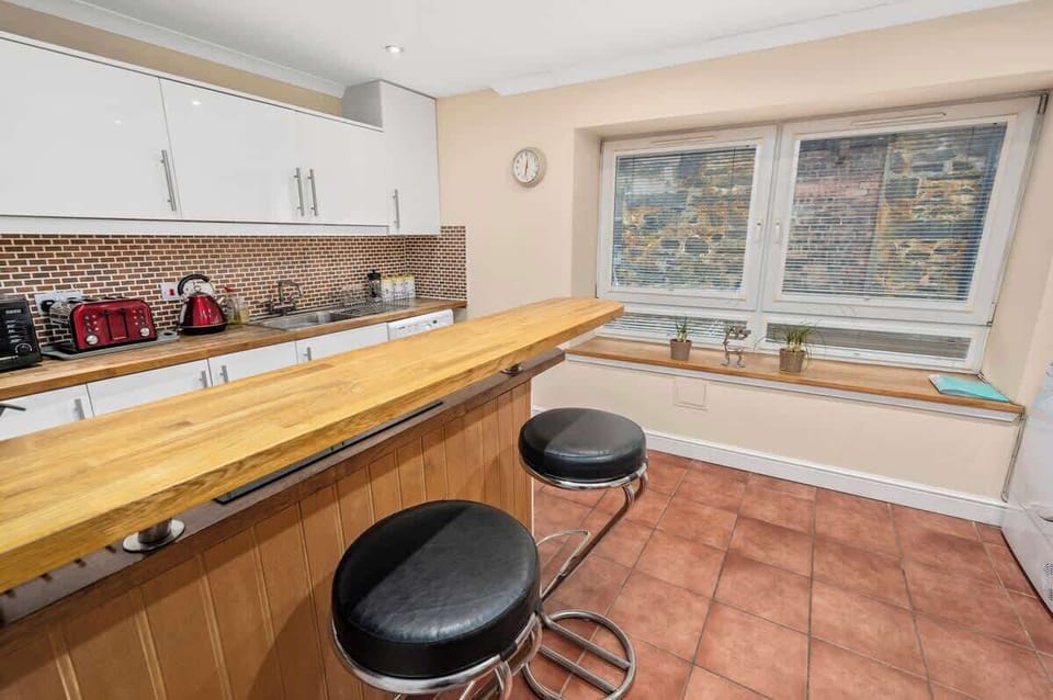 Fully equipped kitchen with all essentials to enjoy a home-cooked meal