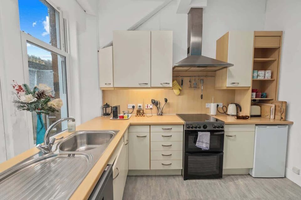 Well equipped kitchen with everything you need for a comfortable stay including double oven, coffee machine, kettle and toaster