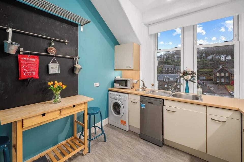 Well equipped kitchen with everything you need for a comfortable stay including washing machine and dishwasher