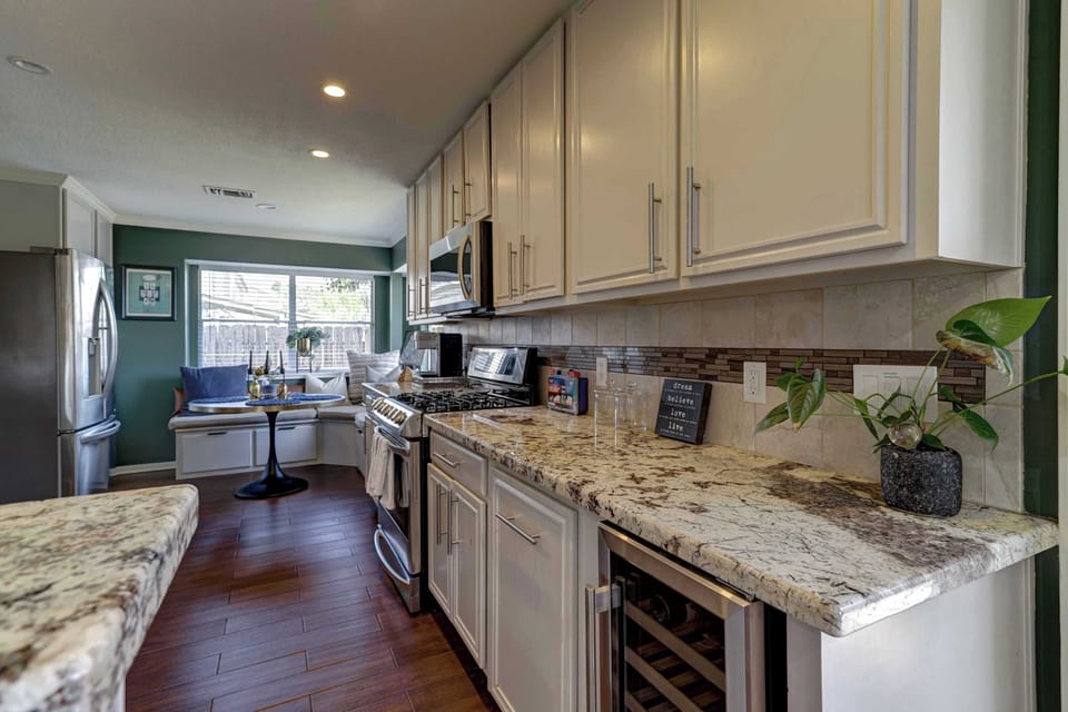 The open, airy kitchen offers ample space & all the comforts of home