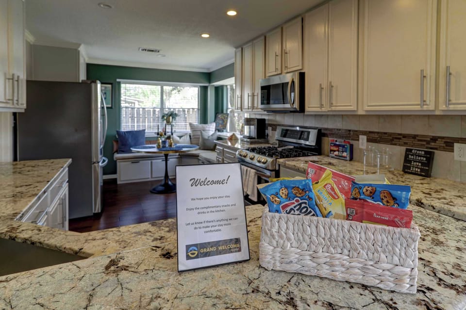 The open, airy kitchen offers ample space & all the comforts of home