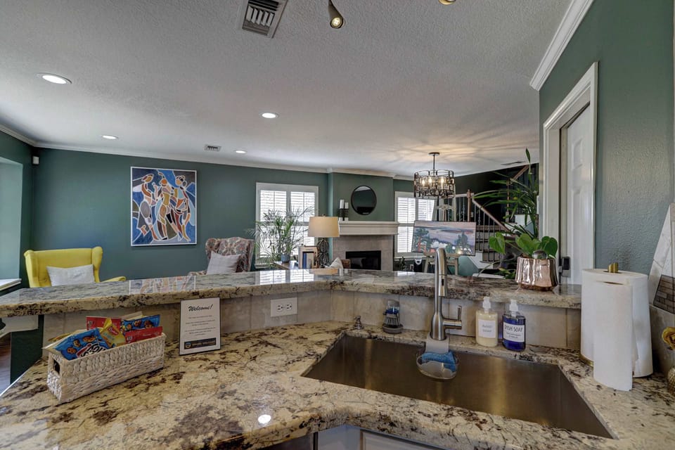 The open, airy kitchen offers ample space & all the comforts of home