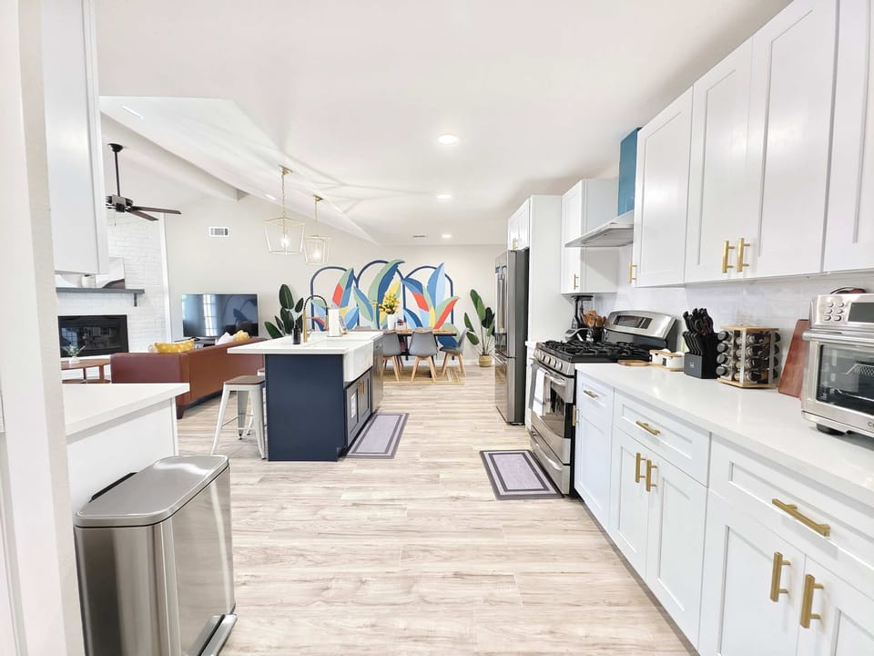 The open, airy kitchen offers ample space & all the comforts of home