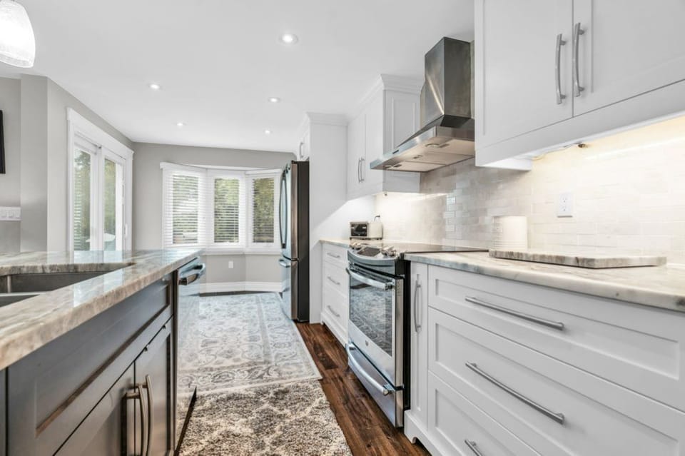 Open Concept Kitchen, Dining Area & Living Area on Upper Level
