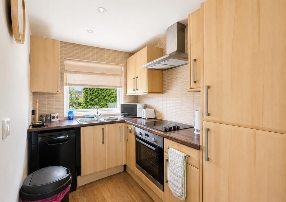 Prepare your favourite holiday meals while being part of the conversation in this convenient chalet kitchen.