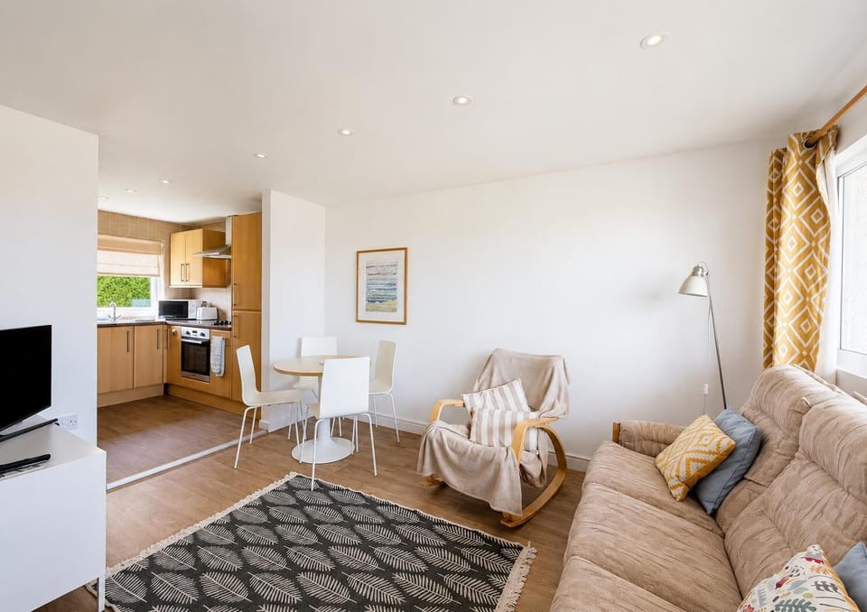 Sit back and relax in this family-friendly, 4-berth chalet, complete with your own decking, just moments from the sandy beach.