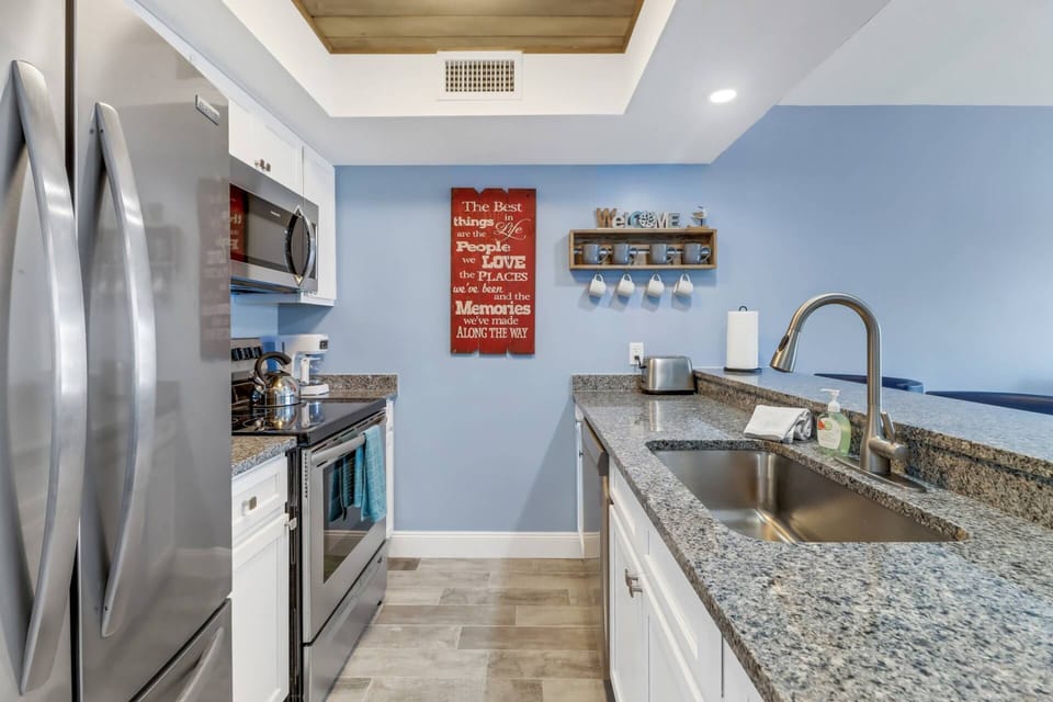 The kitchen is well equipped with full size oven, dishwasher, refrigerator/freezer and microwave; cookware and dinnerware are also provided.