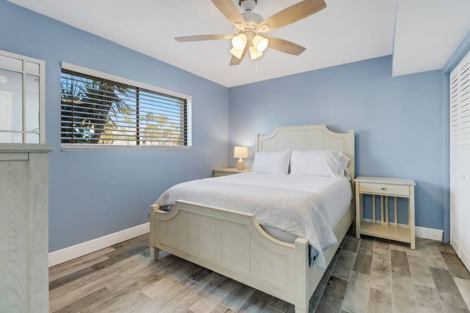 The primary bedroom features a queen bed, made for your arrival with provided linens.