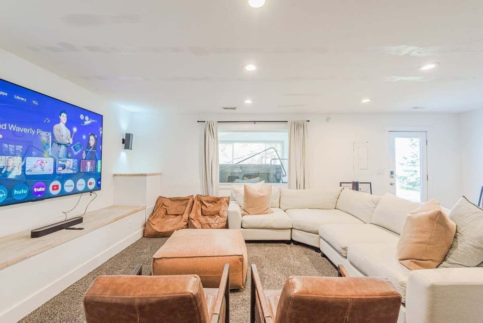 Ultimate Movie Night: Enjoy the big screen on a 98" TV with surround sound in our cozy theater room!