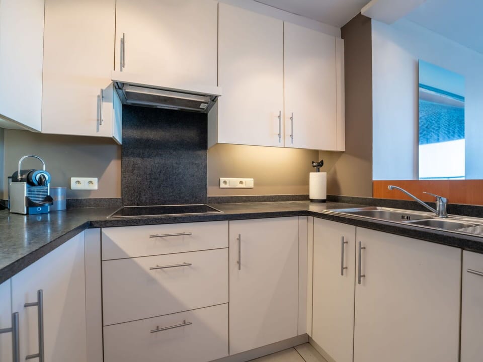 Cabinetry, Countertop, Property, Kitchen Sink, Blue, Kitchen, Kitchen Appliance, Kitchen Stove, Interior Design, Wood