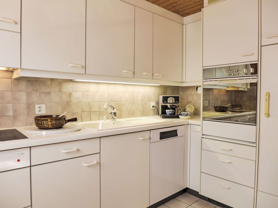 Cabinetry, Countertop, Kitchen Sink, Sink, Building, Kitchen Stove, Kitchen Appliance, Kitchen, Wood, Interior Design