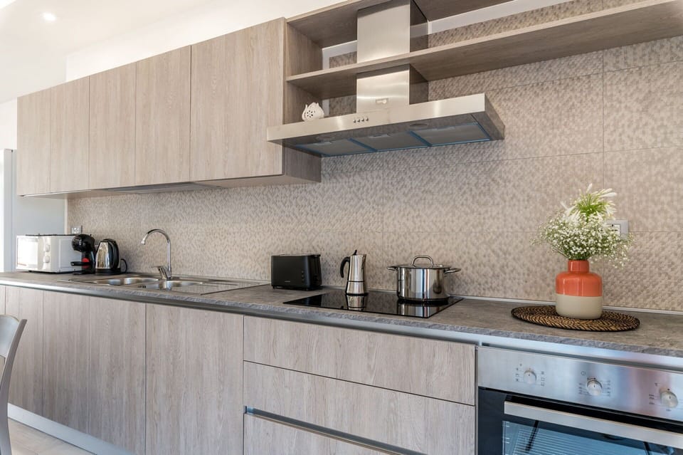 Cabinetry, Countertop, Property, Plant, Wood, Kitchen Stove, Tap, Kitchen, Shelving, Interior Design