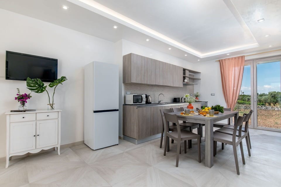 Furniture, Cabinetry, Plant, Building, Table, Houseplant, Countertop, Wood, Interior Design, Flooring