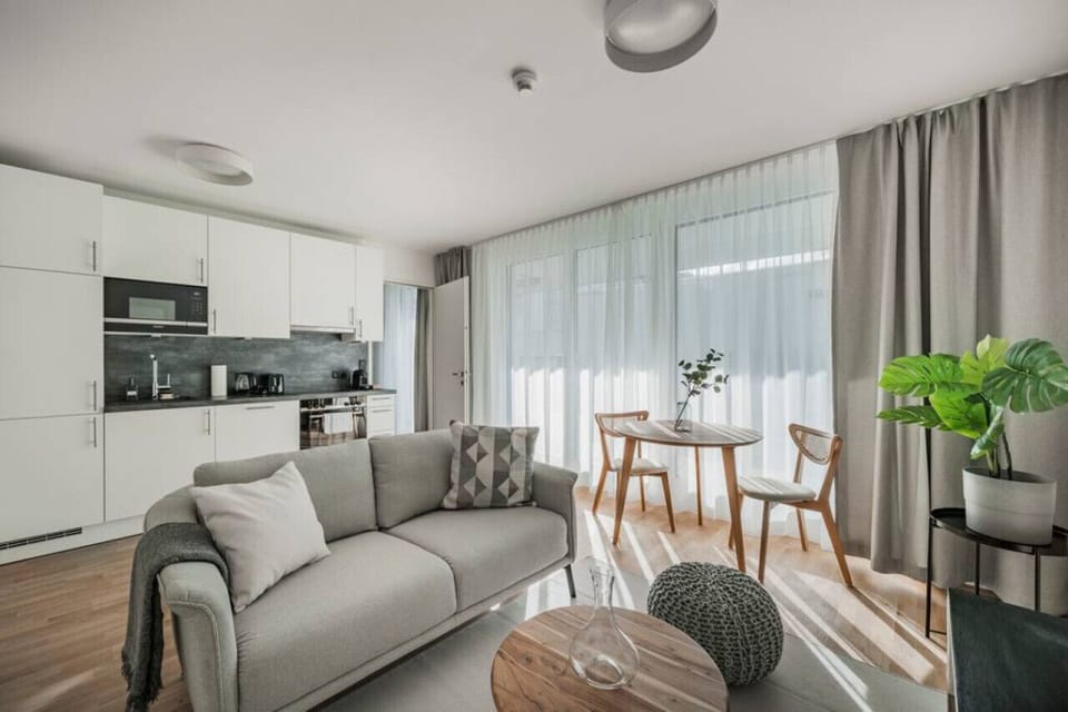 Welcome to the living room, the heart of your home, where Arbio Designers have curated a space for relaxation and togetherness.