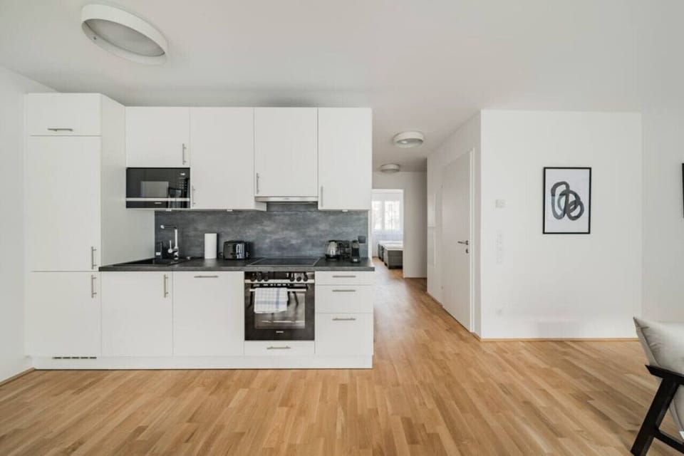 Step into the kitchen, where Arbio Designers have created a culinary haven, blending functionality and style seamlessly.