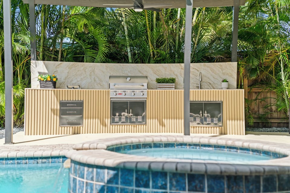 Take a dip in this sparkling pool, complete with a stylish waterfall