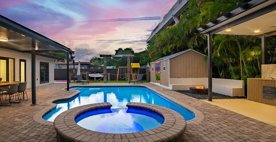 Outdoor BBQ, pool, and dining area – perfect for al fresco meals and relaxation