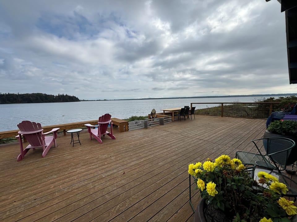 Spacious deck w/two tables and patio chairs. BBQ also, with propane supplied.