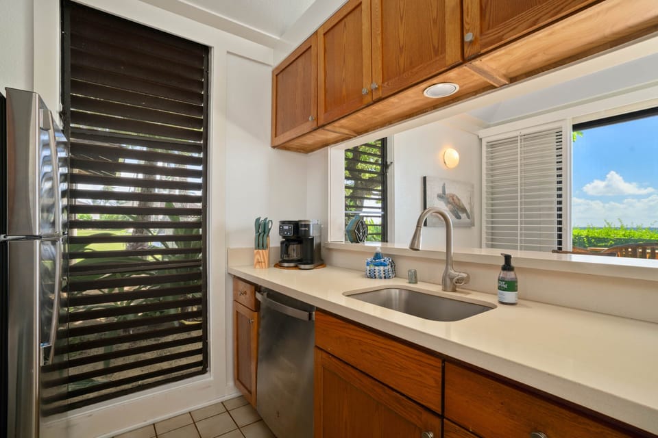 Enjoy ocean views right from the kitchen sink — a bright, breezy space that makes every meal feel li