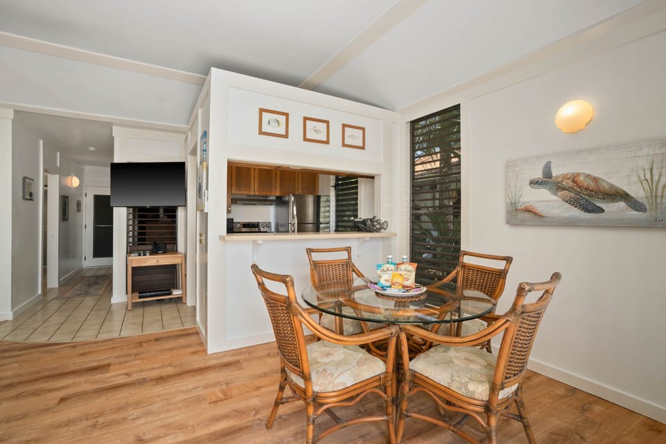 Share island moments around this breezy dining space — where casual comfort meets the charm of coast