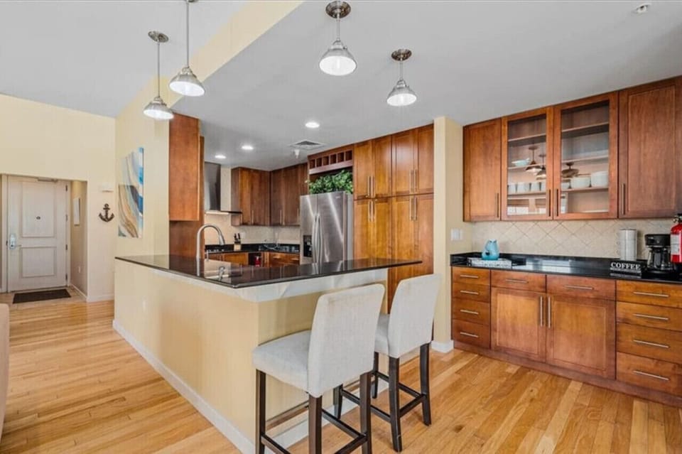 Wake up to the aroma of fresh coffee and enjoy the comfort of a fully equipped kitchen, your home away from home.