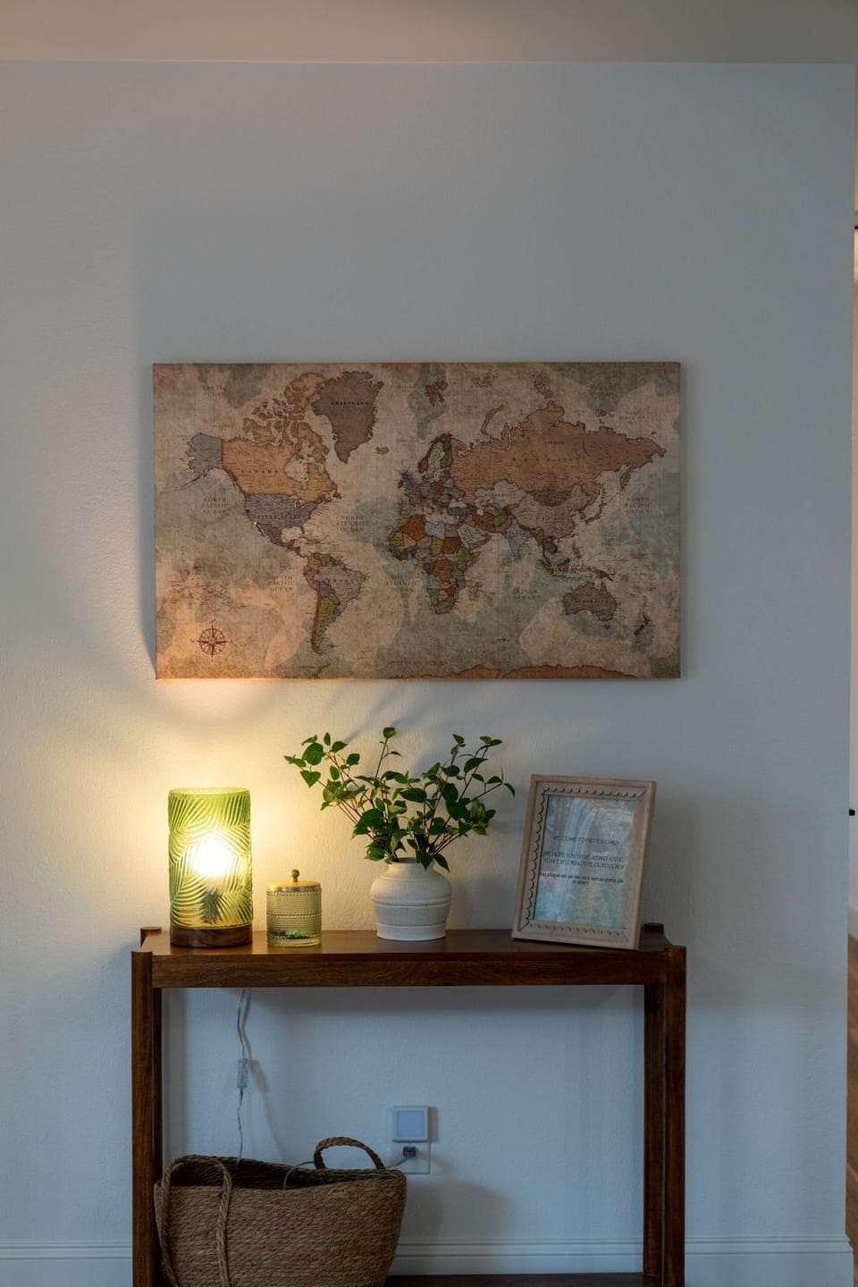 Entry way with canvas map for guests to leave a push pin of where they traveled from