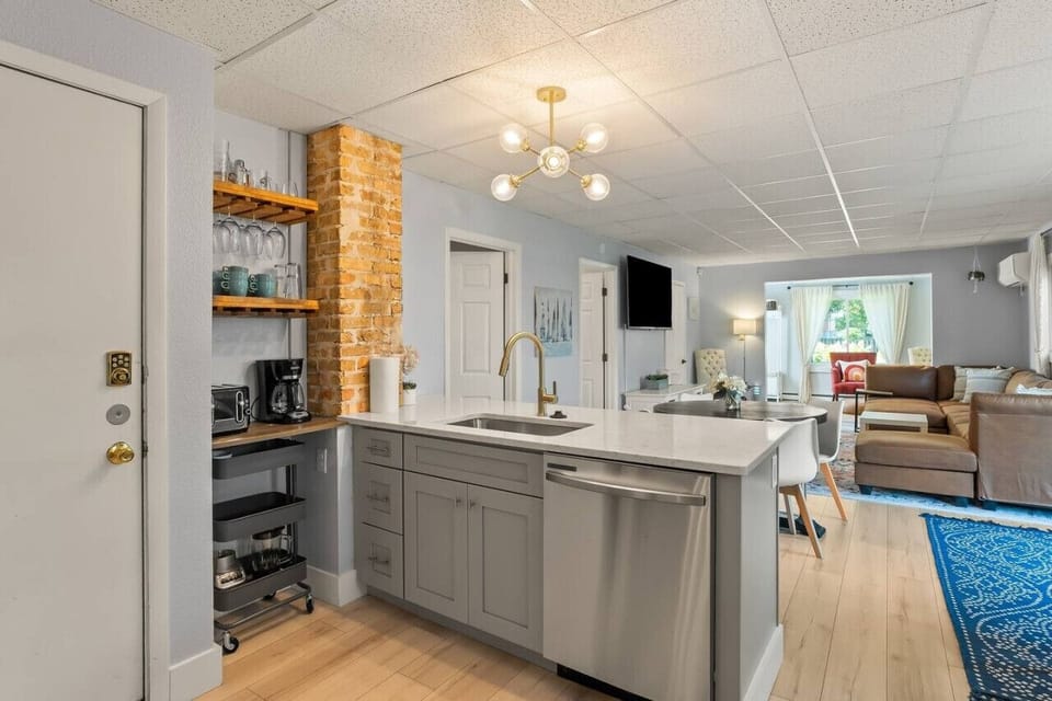 Start your day right in this cozy corner, perfect for making coffee, blending smoothies, or enjoying a quick bite before heading out.