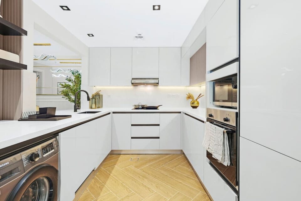 Sleek Kitchen: Modern appliances and stylish design await your culinary adventures!
