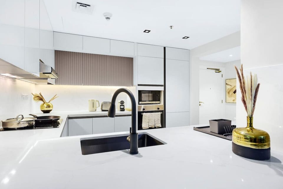 Gourmet Kitchen: Cook up a feast in this stylish, modern kitchen with sleek finishes!