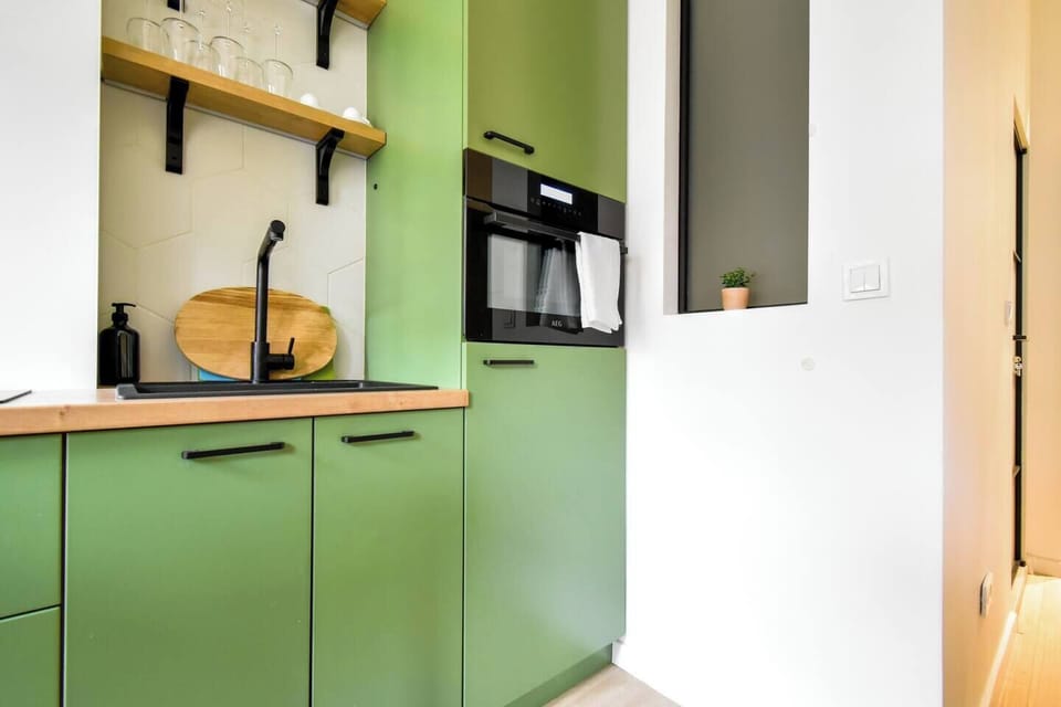 Cook with ease in this thoughtfully designed kitchen, fully equipped for all your culinary needs. Your cozy Sofia stay starts here—book now!