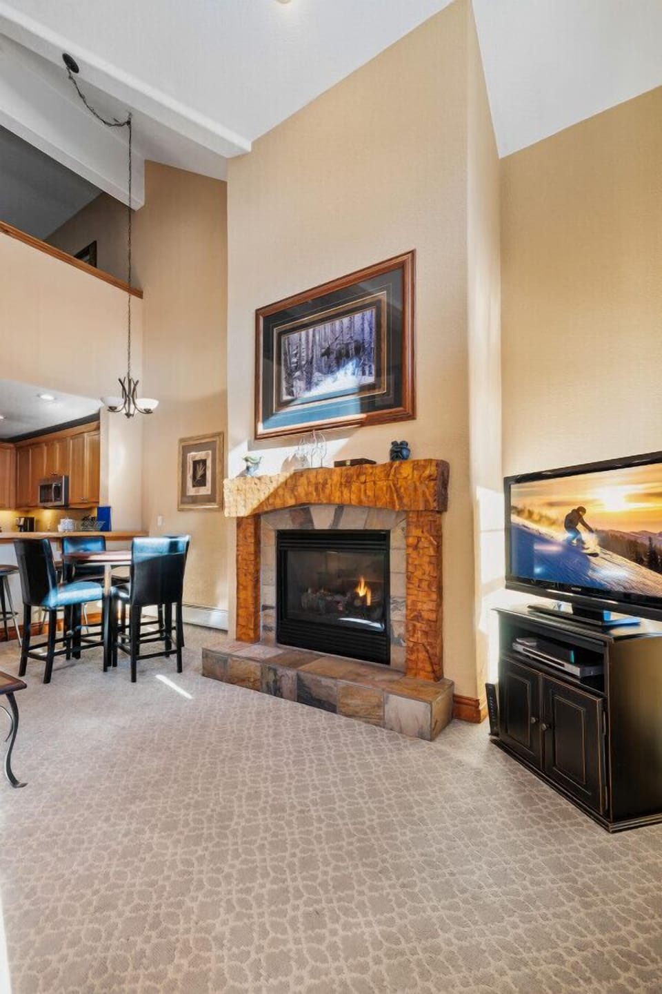 Stunning living room with a large fireplace and a view