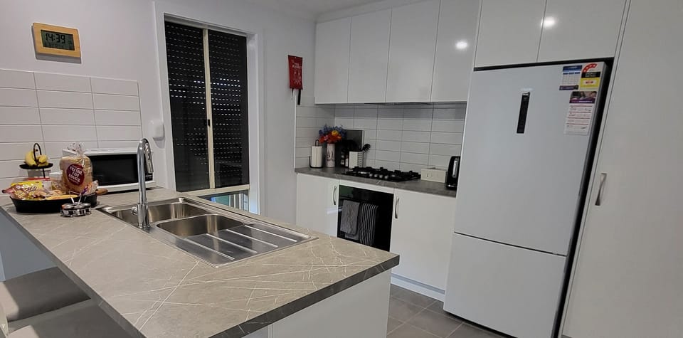 Fully equipped modern kitchen. Dishwasher, Microwave, Toaster, Kettle available.