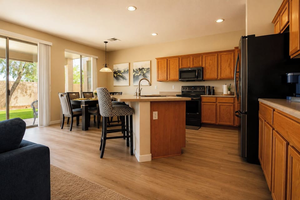Open concept kitchen and dining area for gathering together. 