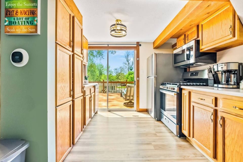 Cooking is a breeze in the fully stocked kitchen that includes a dishwasher