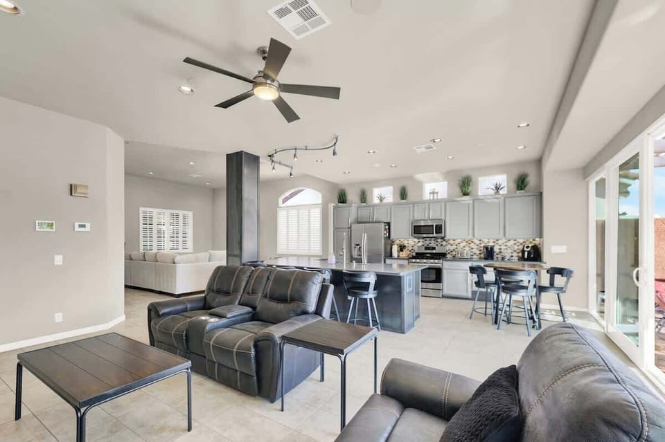 Kick back and relax in a spacious living room made for comfort and entertainment.