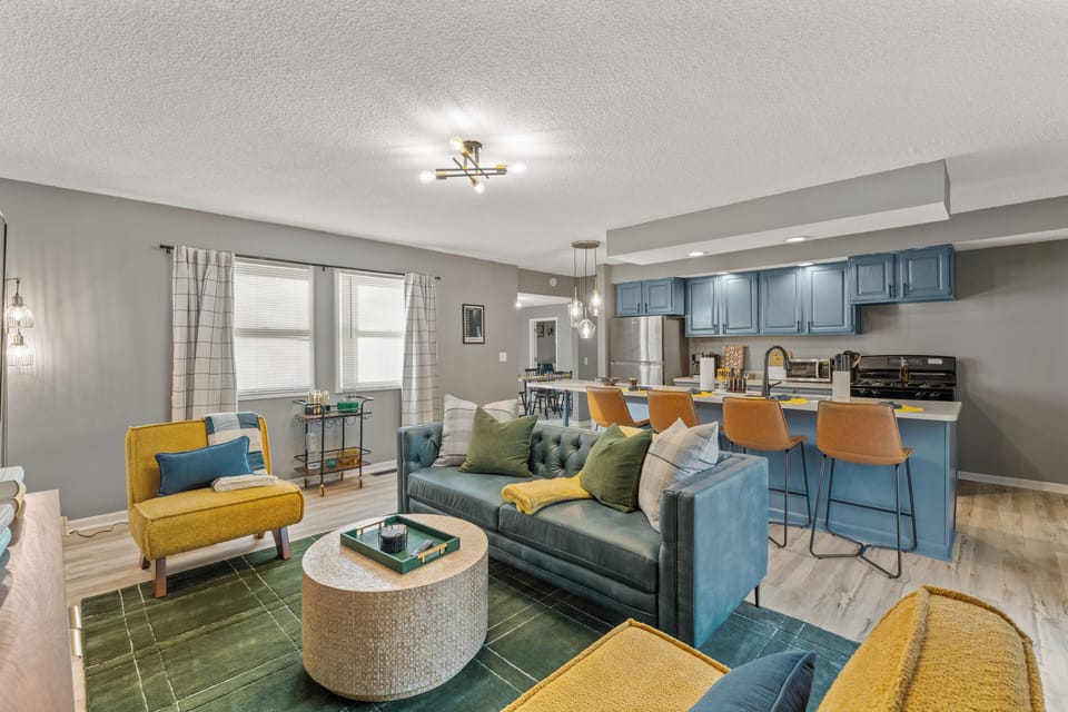Living room with plush couch and beverage cart