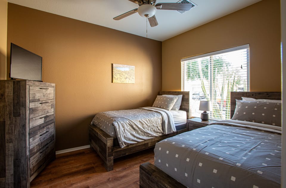 Third Bedroom Has 2 Twin Beds and a Smart TV