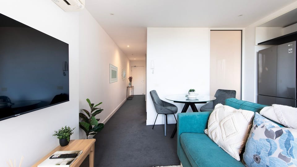 Stylish lounge with smart TV and comfortable seating