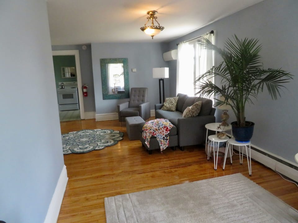 View of the newly remodeled living room from the dedicated work space.