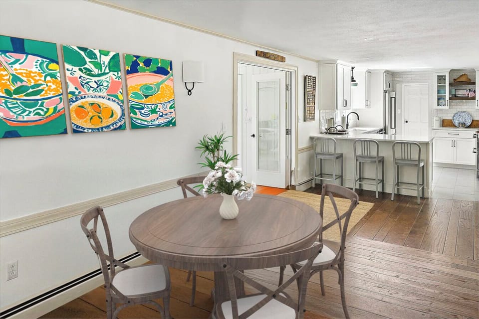 Dining area behind attached to the living room.