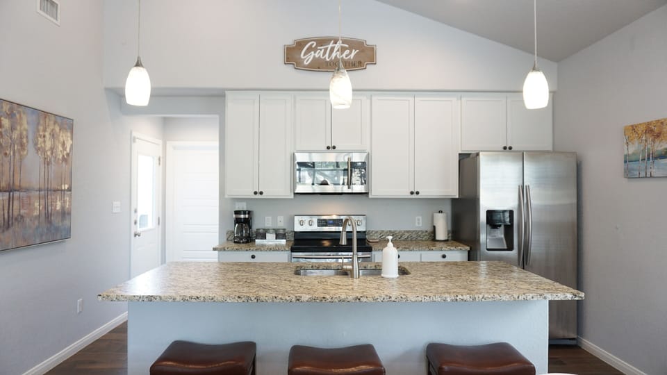 Bar seating and a fully equipped kitchen to satisfy all your cooking needs.