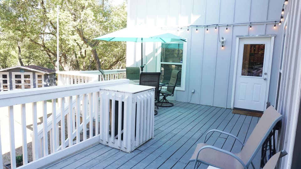 Day or night, the back deck is a great place to hang out.