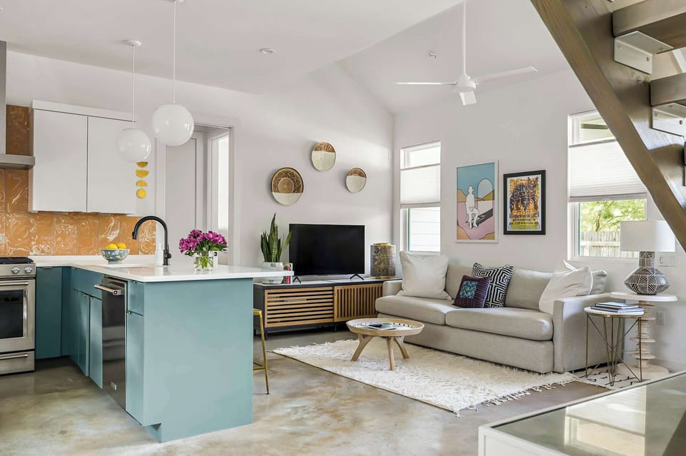 Step into a warm and inviting living room designed for relaxation and connection.