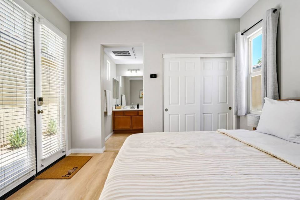 Relax in comfort with a plush queen bed and stylish décor.