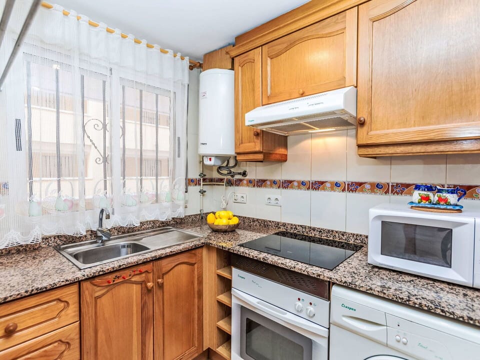 Kitchen, Major Appliance, Countertop, Cabinetry, Interior Design, Kitchen Appliance, Flooring, Home, Floor, Furniture