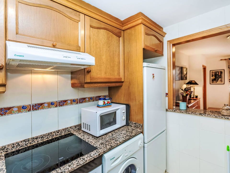 Flooring, Interior Design, Major Appliance, Kitchen, Floor, Countertop, Apartment, Home, Room, Cabinetry