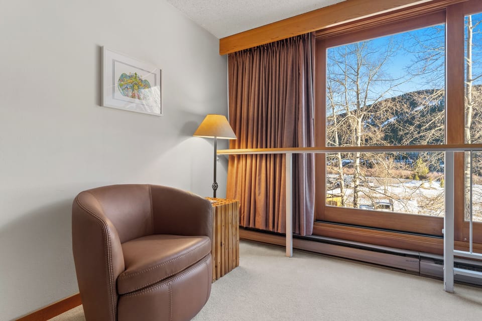 Reading nook near the windows to enjoy the mountain views.