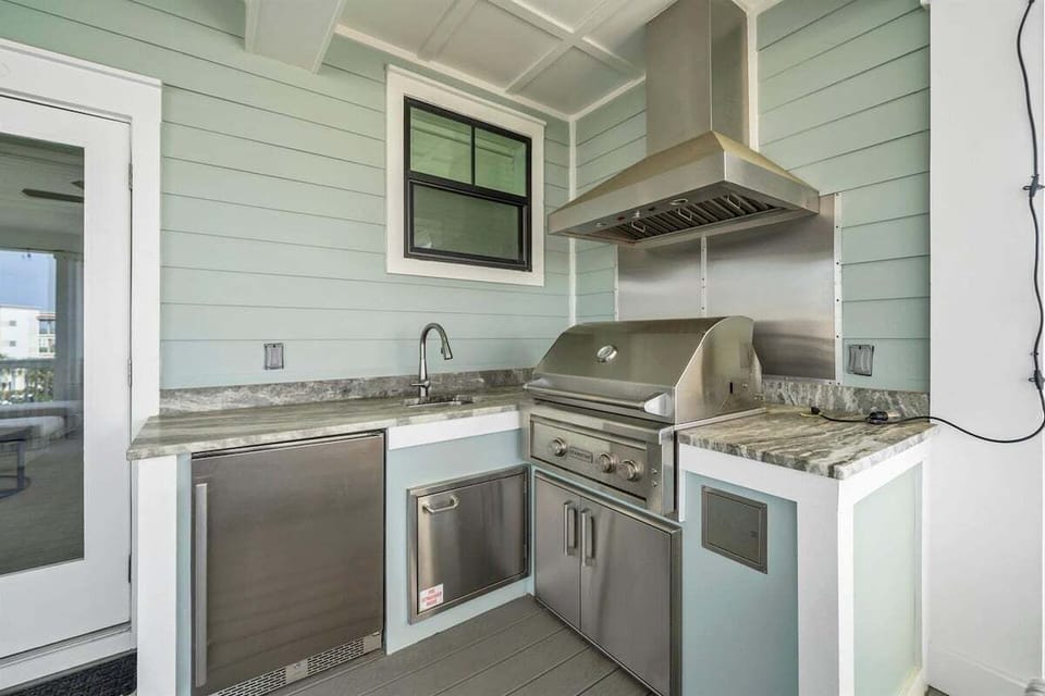 Party deck outdoor kitchen with warm stations